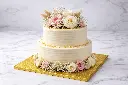 Elegant bridal cake with floral accents.webp